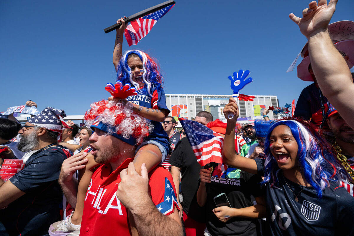 USA fan Izzy Ferguson, 9, sits on the shoulders of her father, Patrick Ferguson, alongside her sister, Gianna Gomes, 13, before the FIFA World Cup 2026 Round of 32 match between the United States and Bosnia and Herzegovina at Levi's Stadium on Wednesday, July 1, 2026, in Santa Clara.